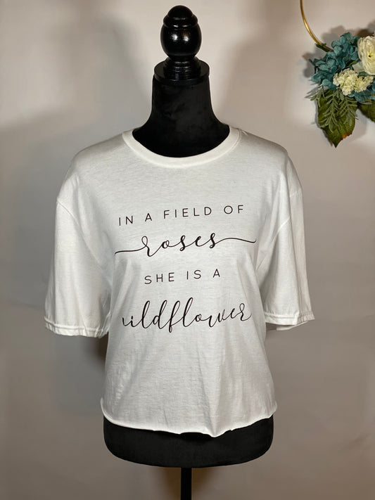 “In a Field of Roses She is a Wildflower” Crop Top